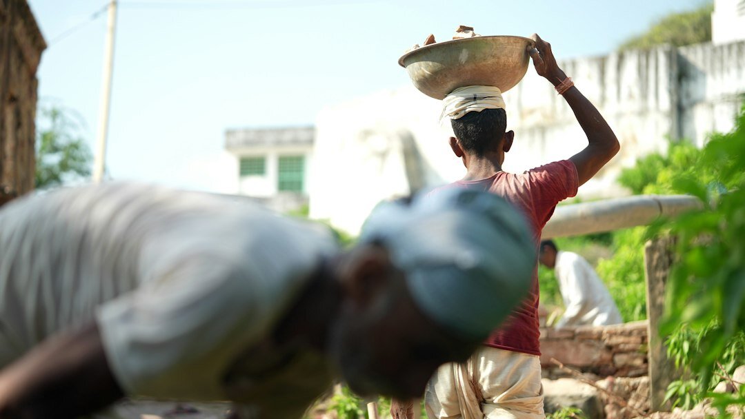 elderly person receiving help in village