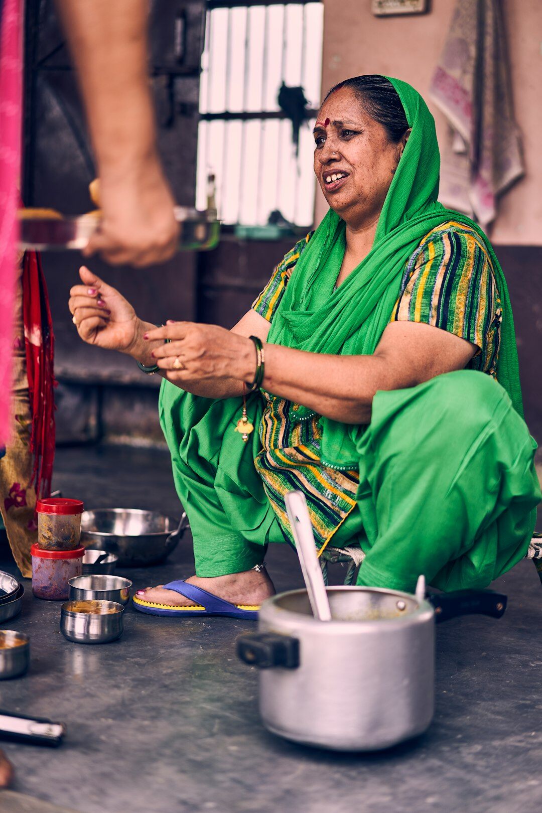 elderly woman sharing village story